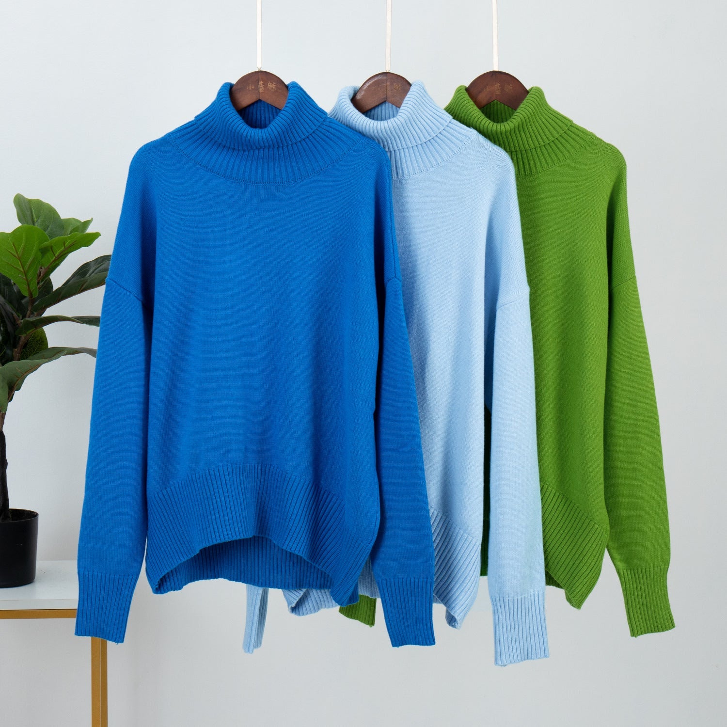 Oversized Knit Blouse with High Neck Design