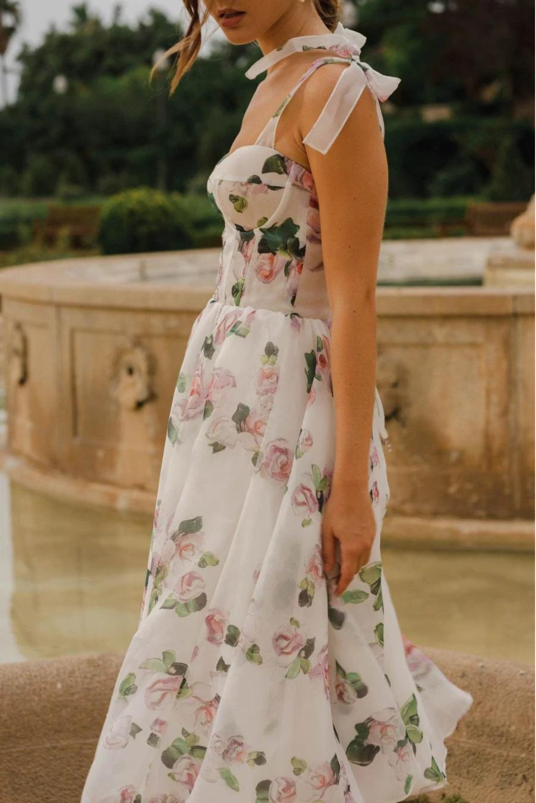 Floral Midi Strapless Dress with Flowing Skirt and Elegant Design