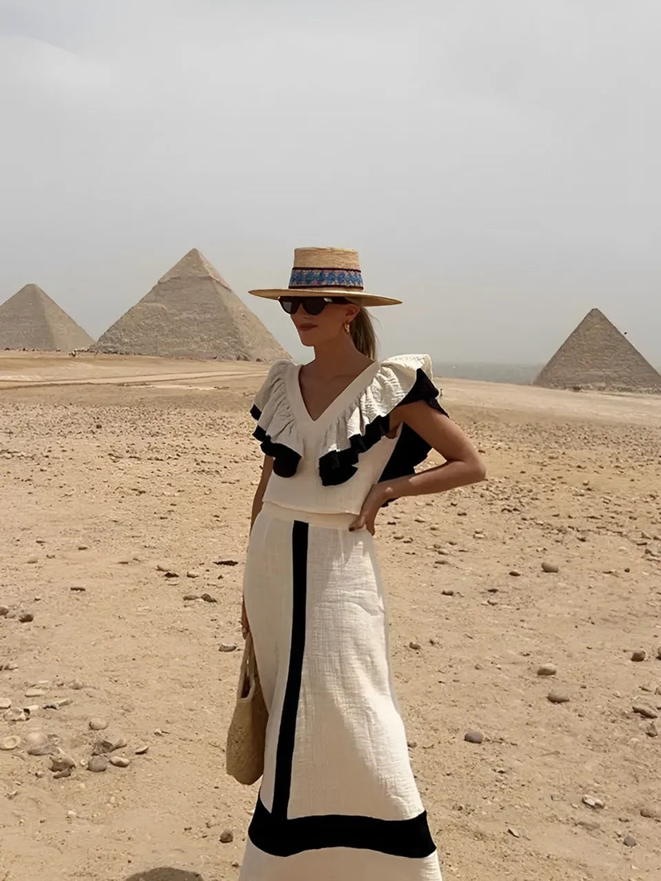Elegant Two-Piece Women's Outfit with Stylish Top and Skirt
