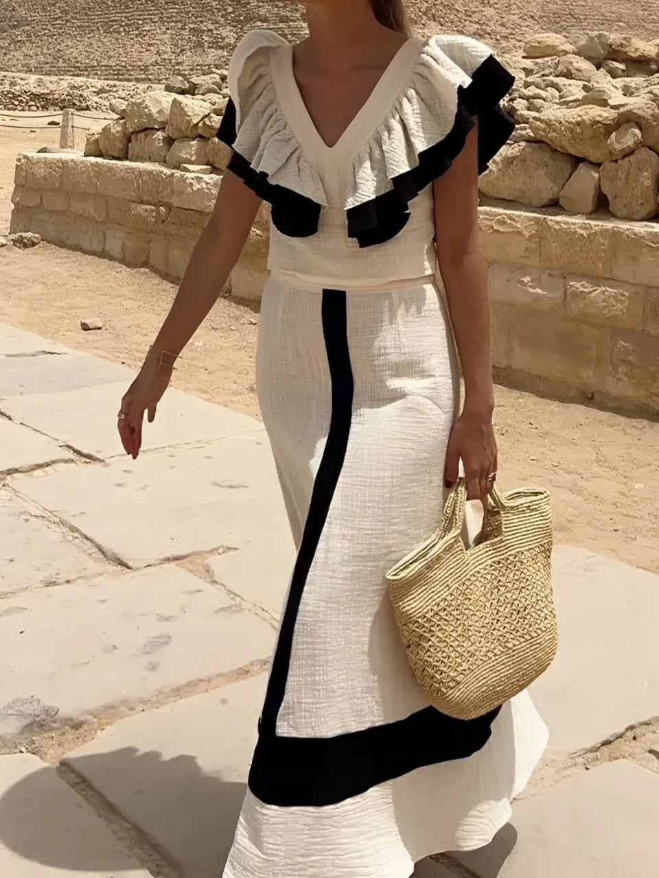 Elegant Two-Piece Women's Outfit with Stylish Top and Skirt