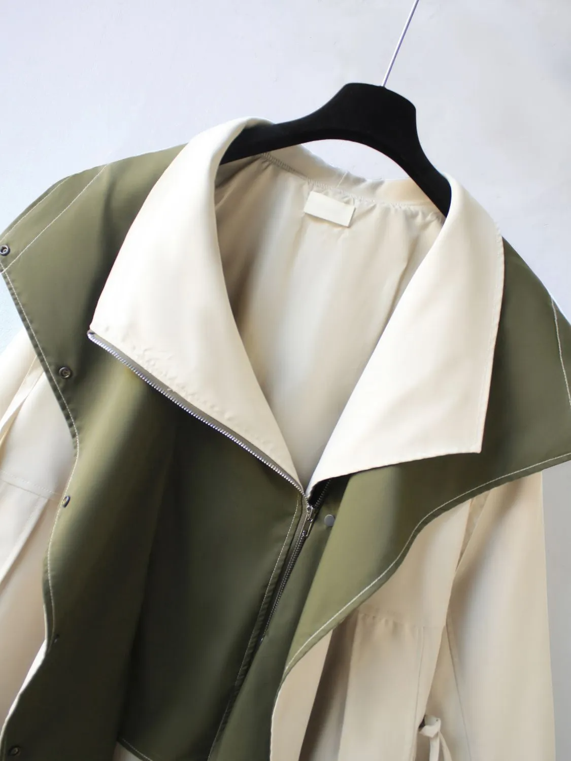 Two-Layer Jacket with Zip Closure and Button Details