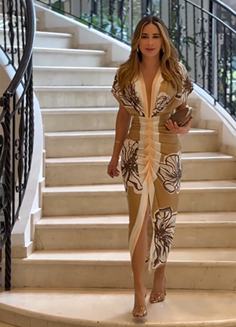 Long Dress with Deep Neckline and Elegant Flowing Design