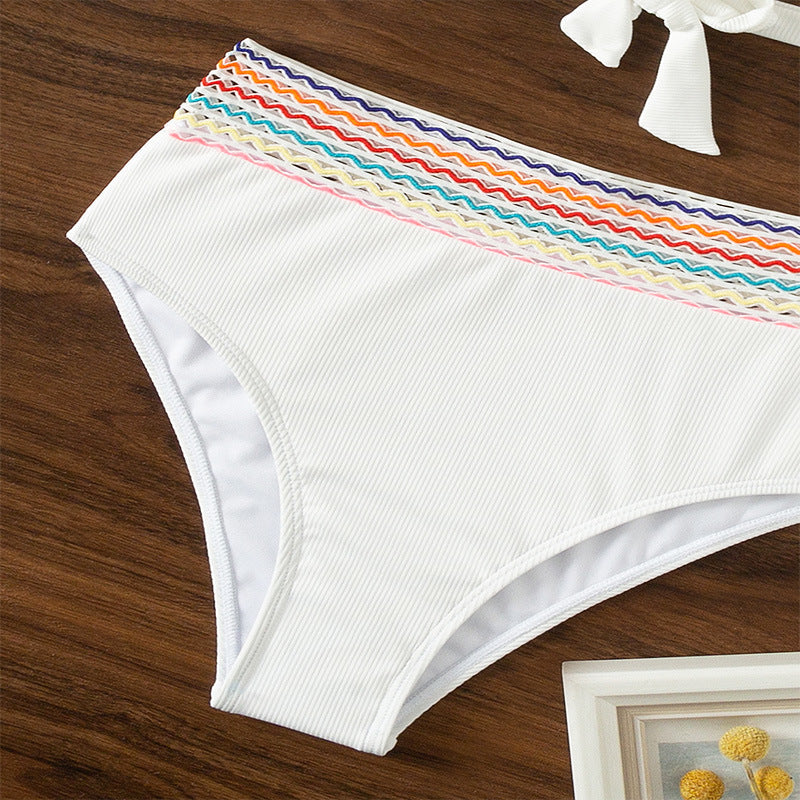 High-Waisted Bikini with Crossed Straps and Stylish Color Options