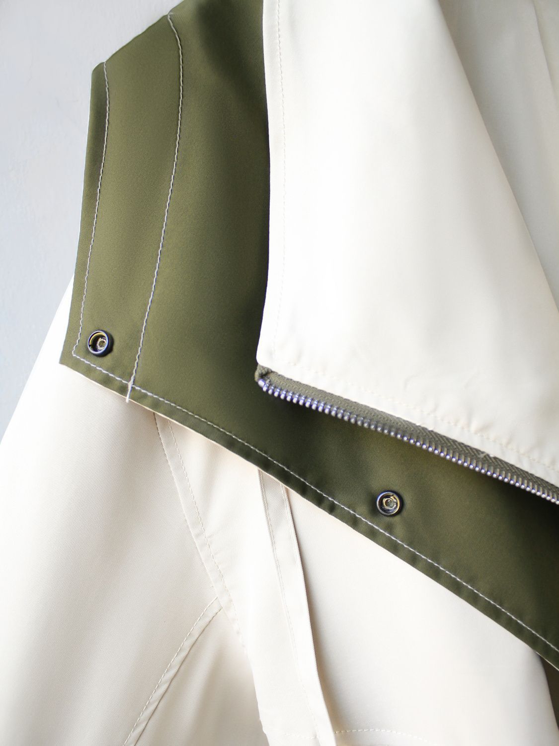 Two-Layer Jacket with Zip Closure and Button Details