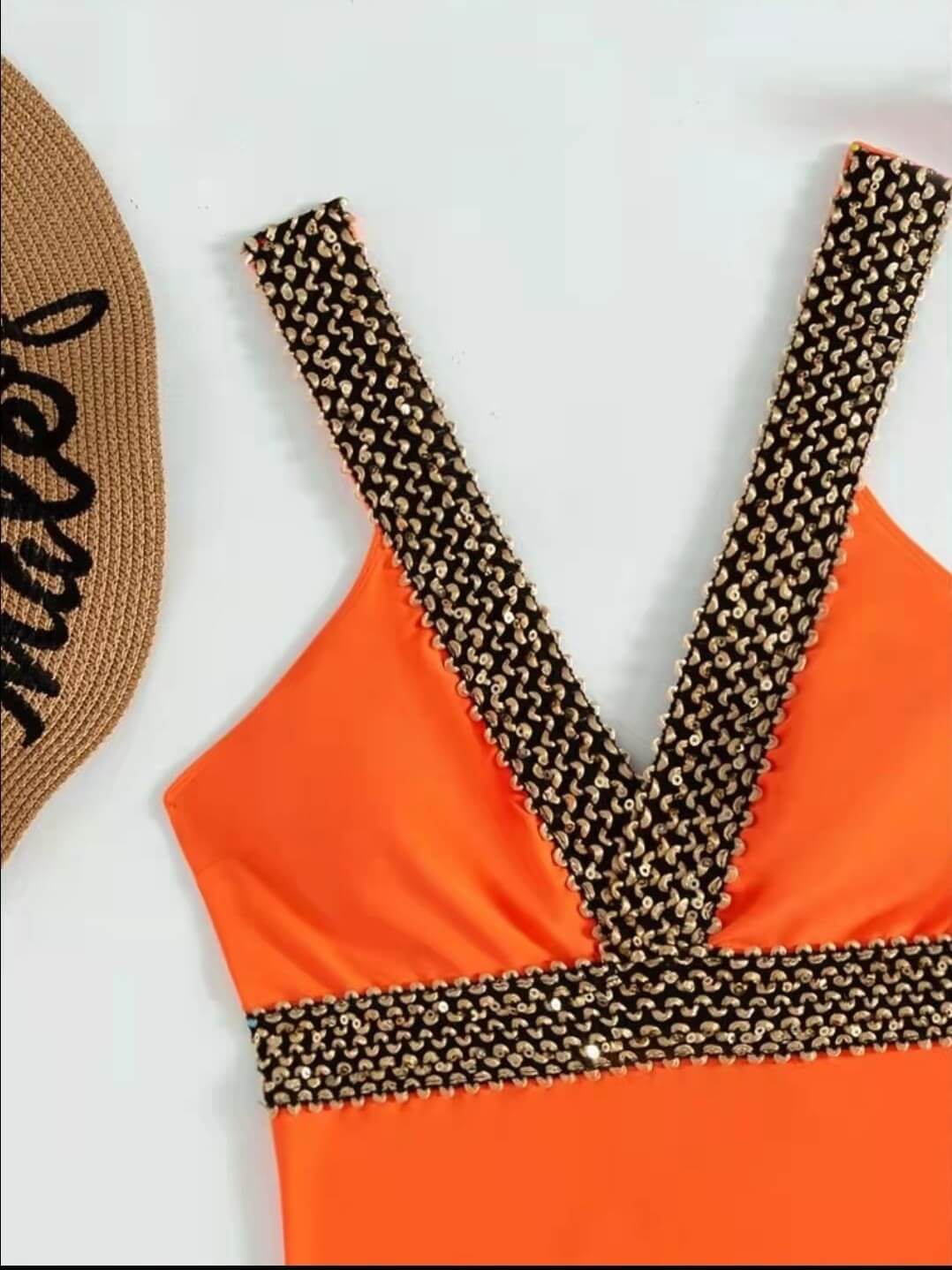 V-Neck Swimsuit Featuring Elegant Gold Accents