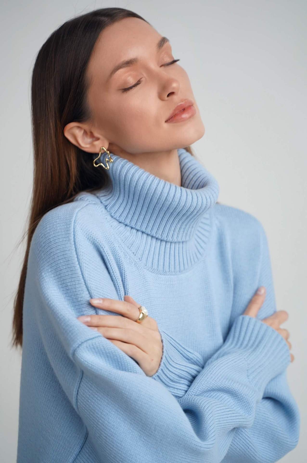 Oversized Knit Blouse with High Neck Design
