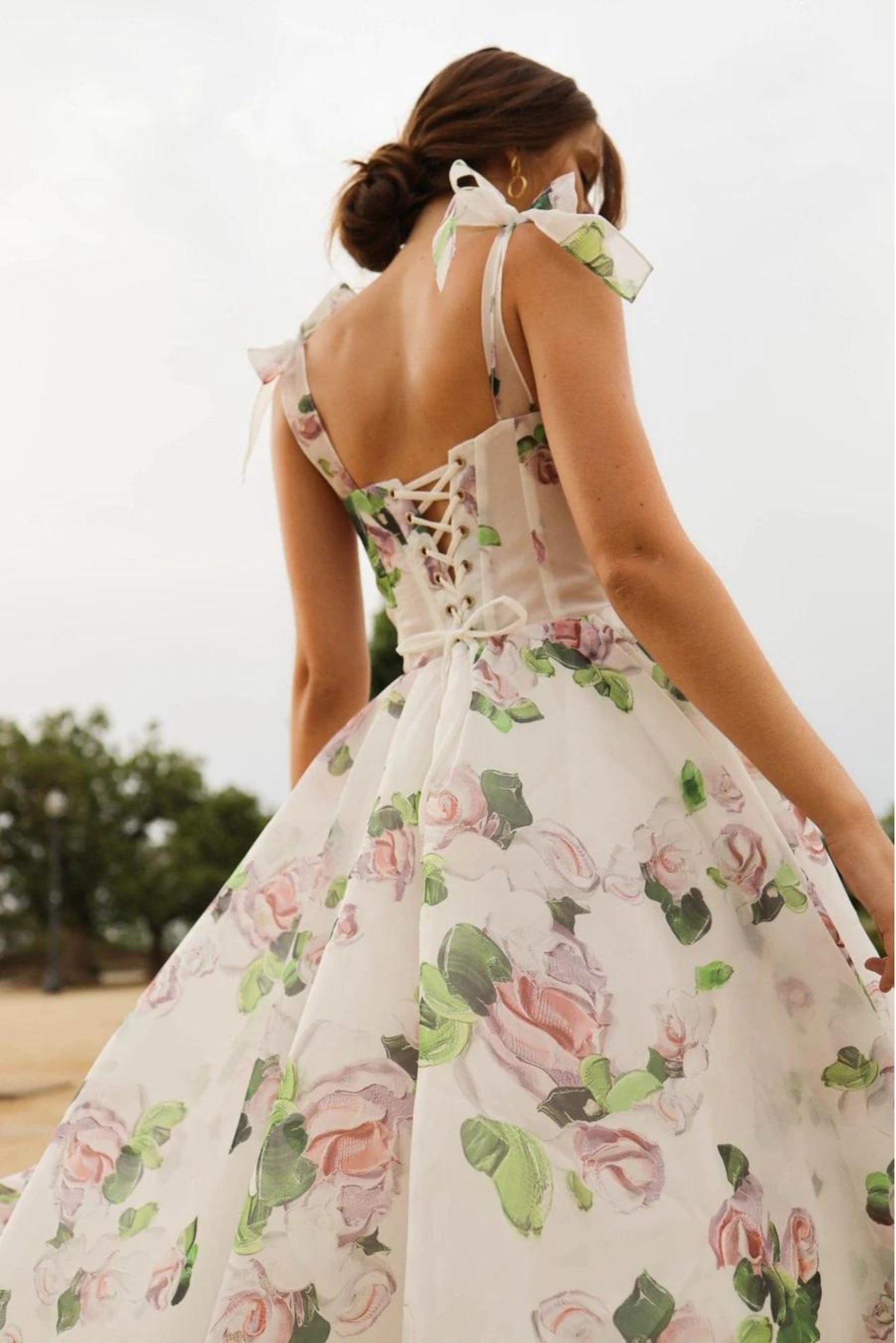 Floral Midi Strapless Dress with Flowing Skirt and Elegant Design