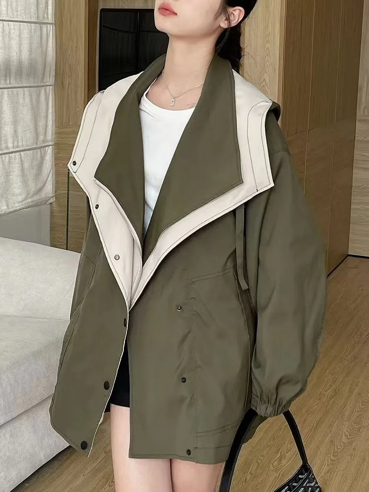 Two-Layer Jacket with Zip Closure and Button Details