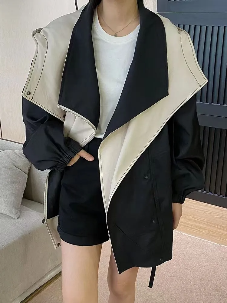 Two-Layer Jacket with Zip Closure and Button Details