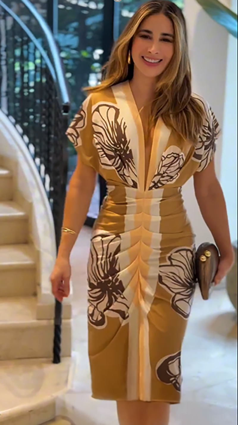 Long Dress with Deep Neckline and Elegant Flowing Design
