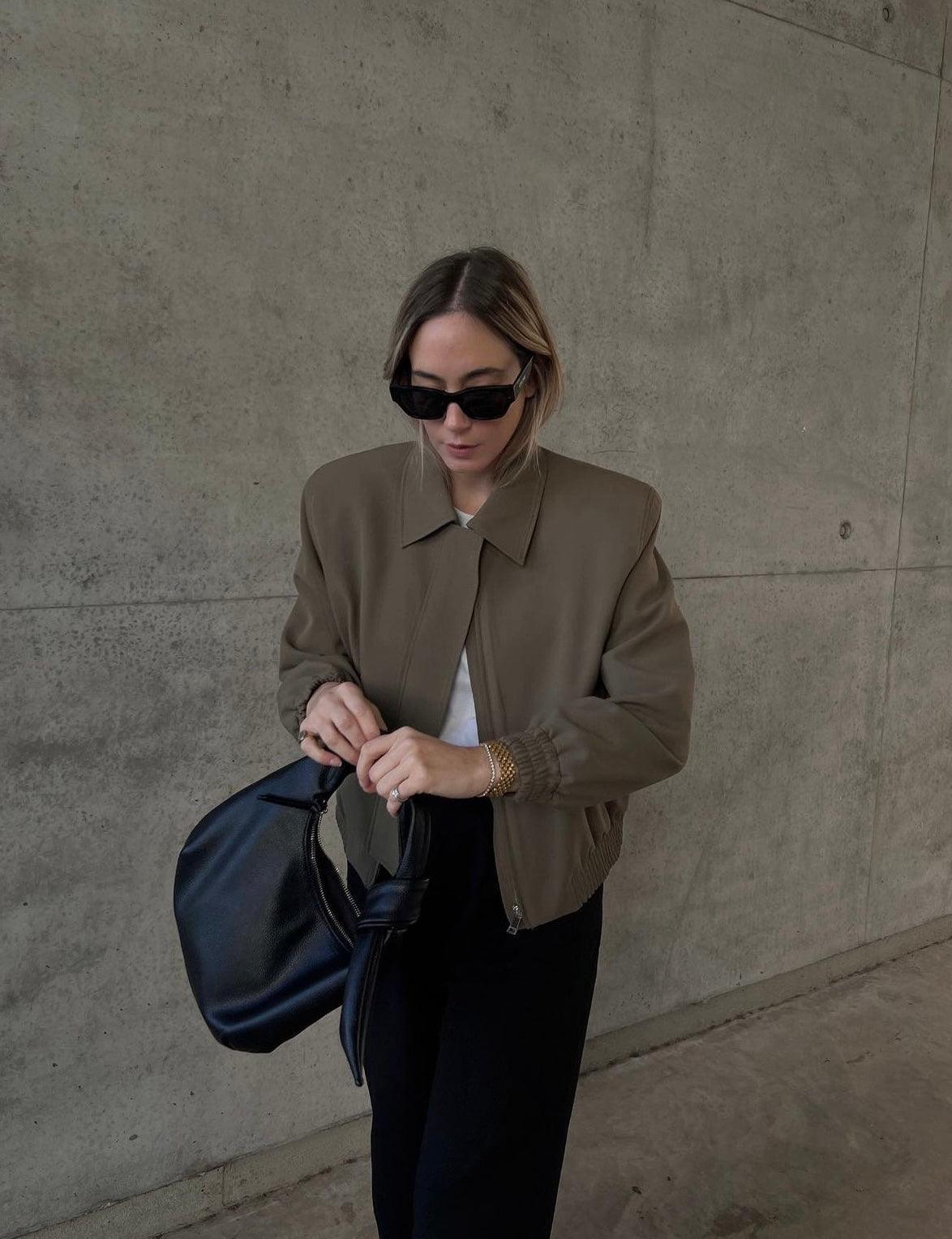 Lightweight Women's Jacket with Zip Pockets and Adjustable Cuffs