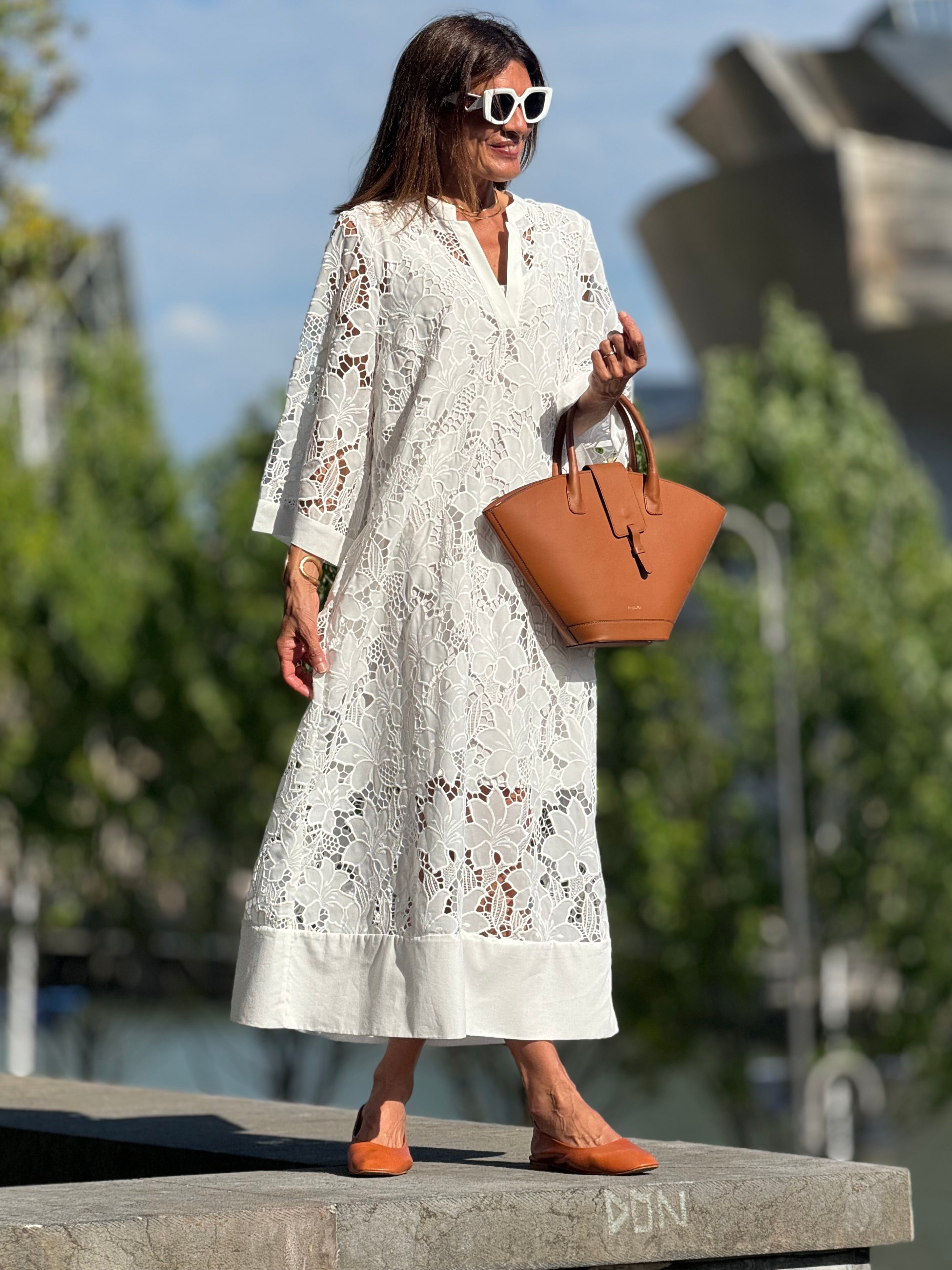 White Lace Dress with Elegant Detailing for Special Occasions